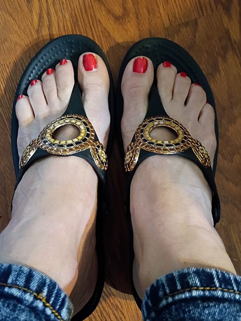 Crocs Black Sandals with Gold Ring Accent